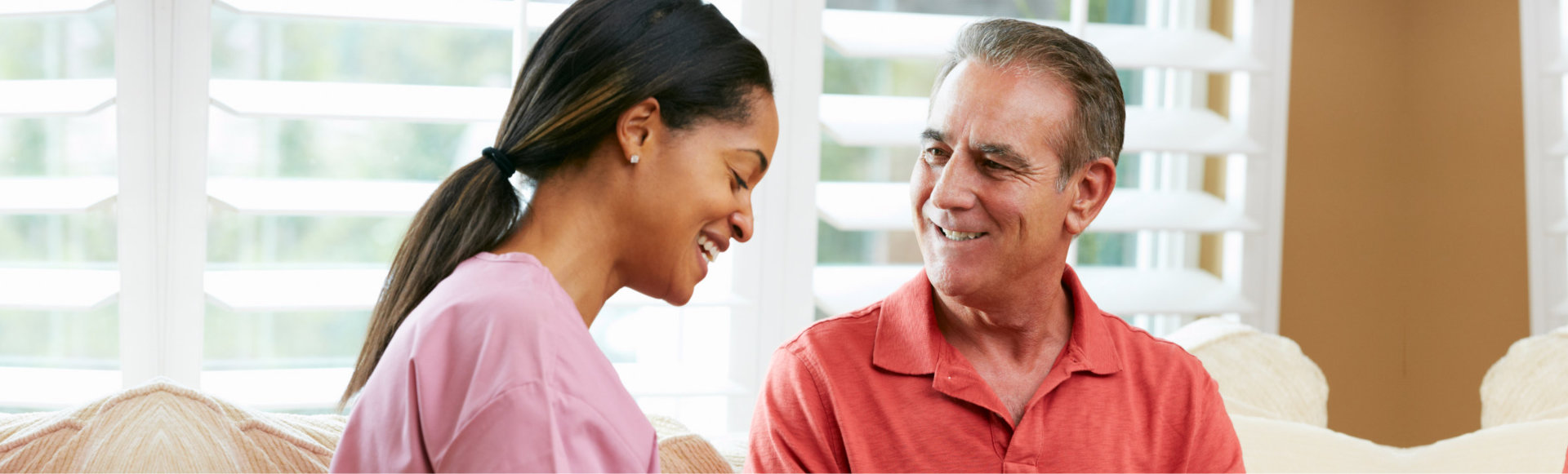 patient looking to his caregiver while smiling