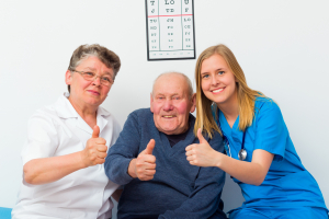 thumbs up senior patient and doctors